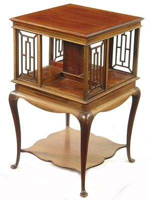 Appraisal: A mahogany revolving bookstand with satinwood banding and stringing the