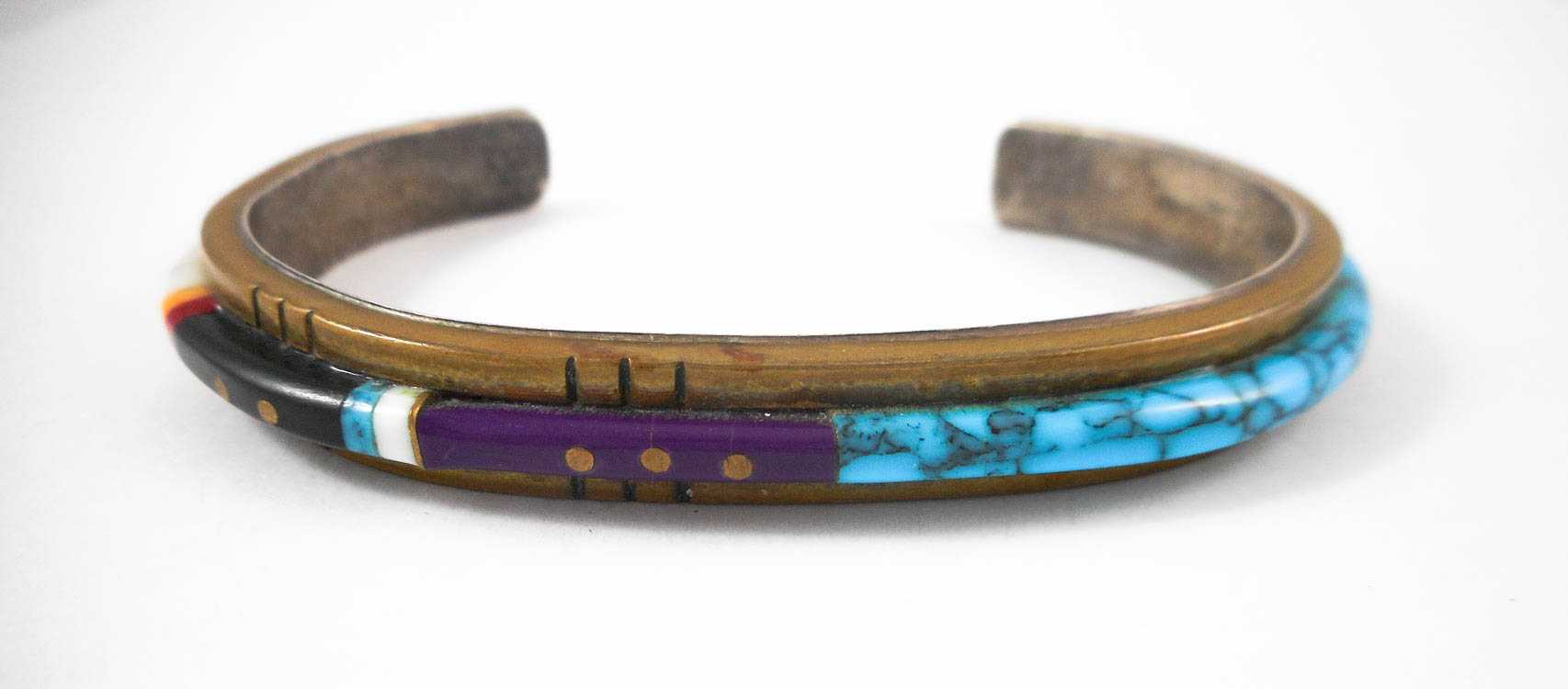 Appraisal: NAVAJO STERLING CUFF BRACELET attributed to Abraham Begay inlaid with