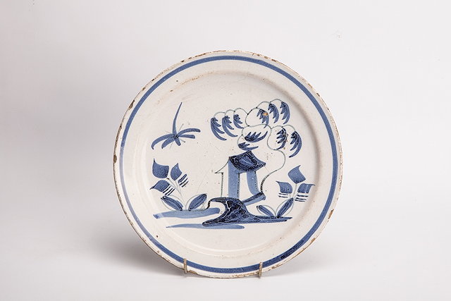 Appraisal: AN EARLY BRISLINGTON DELFT PLATE circa with simple blue dash