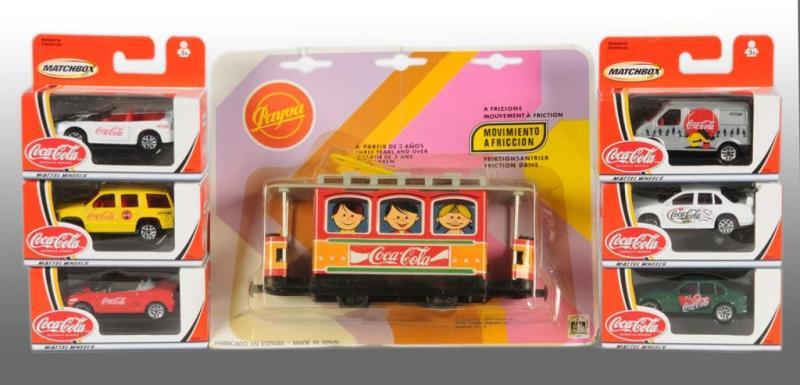 Appraisal: Lot of Coca-Cola Vehicle Toys Description Includes Matchbox Coca-Cola trucks