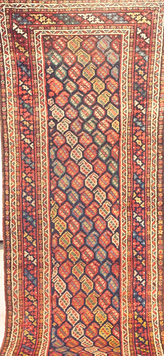 Appraisal: CAUCASIAN KAZAK Runner with center panel of overall polygons in