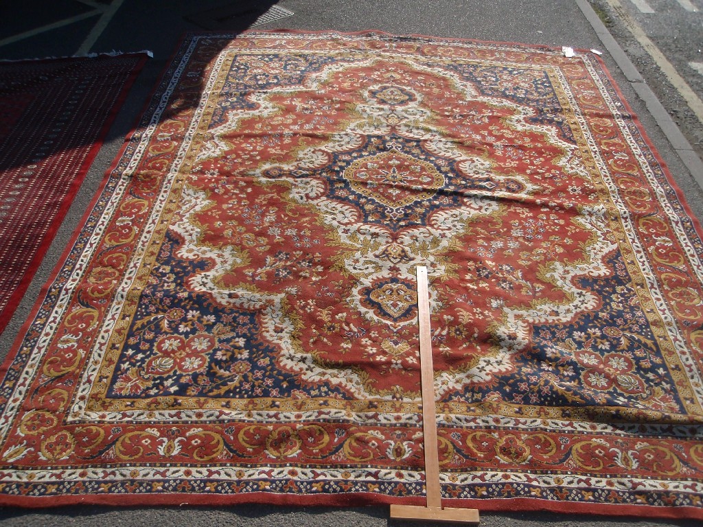 Appraisal: A Tabasco Persian design machine-made carpet cm x cm