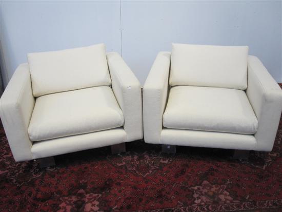 Appraisal: PAIR OF TUXEDO STYLE CLUB CHAIRS ON CHROME BASE A