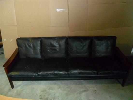 Appraisal: A DANISH BLACK LEATHER FOUR SEAT SOFA with rosewood frame