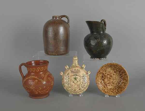 Appraisal: Two redware pitchers together with a jug a flask and