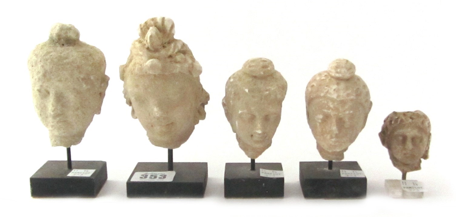 Appraisal: Five Gandharan stucco heads of Buddha th century a f