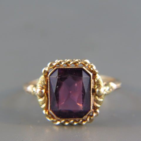 Appraisal: Amethyst Ring emarald cut gem weighingover carats in K yellow