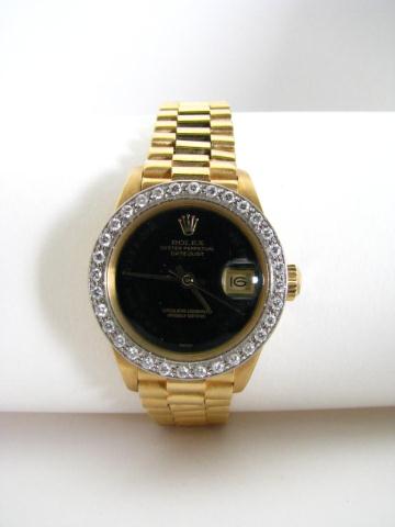 Appraisal: Lady's K Yellow Gold Oyster Perpetual Datejust diamonds set on