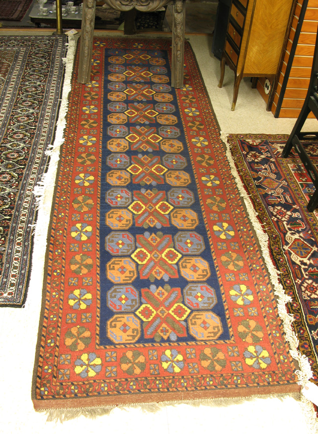 Appraisal: PERSIAN BELOUCHI TRIBAL RUNNER the blue field decorated in repeating