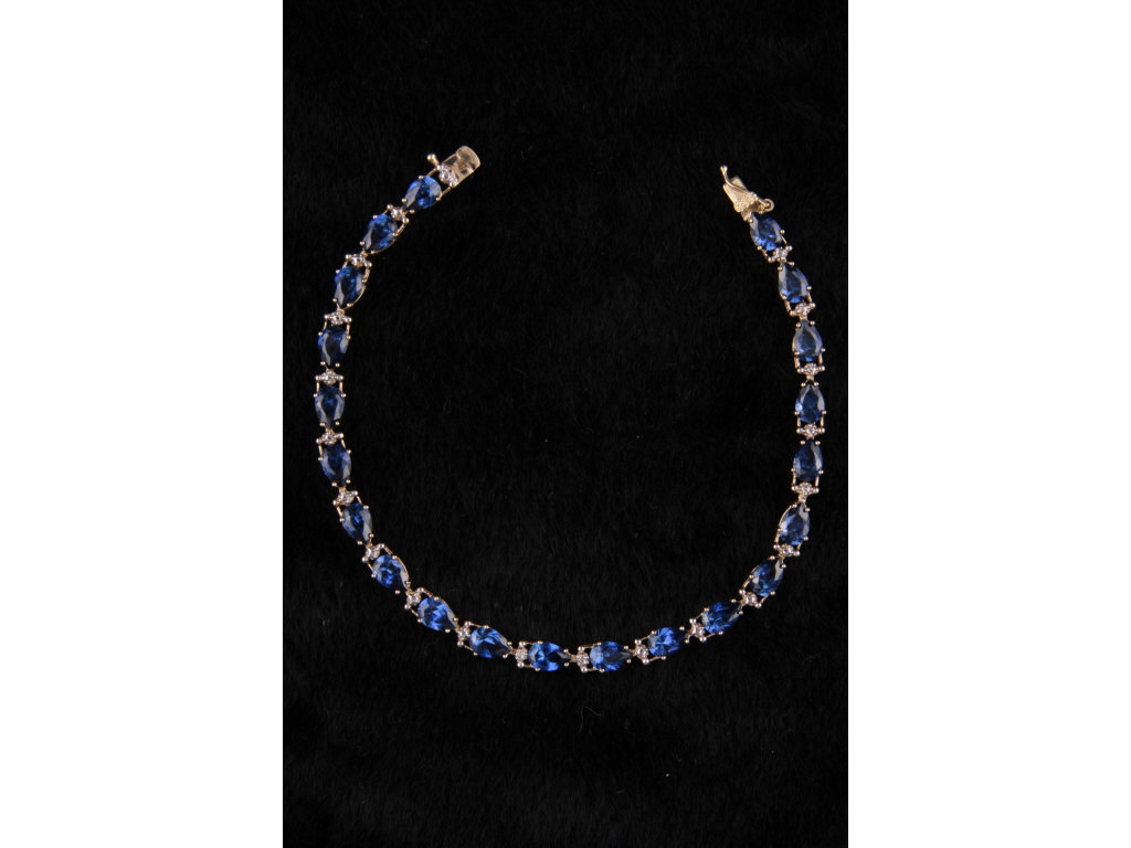 Appraisal: K Yellow Gold and Sapphire Bracelet containing pear shape synthetic