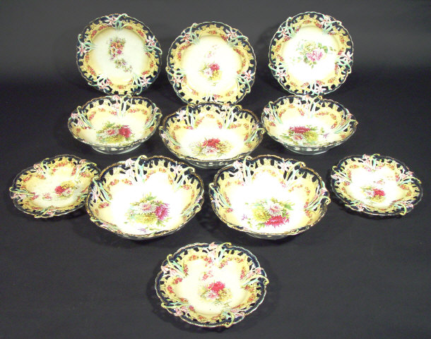 Appraisal: Set of pierced Continental china plates and bowls each printed