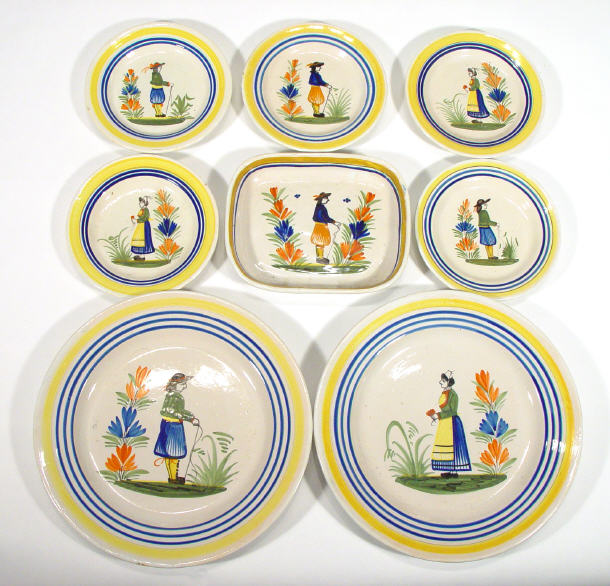 Appraisal: Eight Quimper pottery dishes hand painted with peasants comprised two