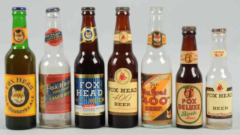 Appraisal: Lot of Labeled Enameled Beer Bottles Includes Fox Head and