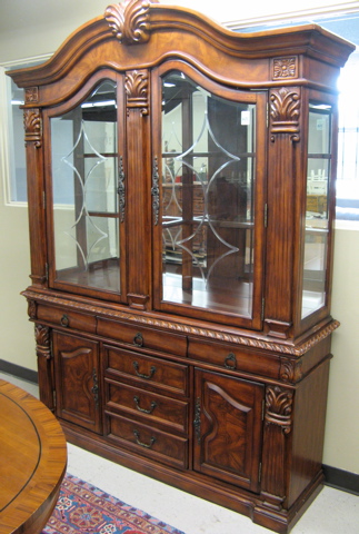 Appraisal: CHINA CABINET ON BUFFET of matching carved mahogany and burl