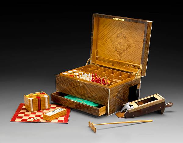 Appraisal: An English zebra wood games compendium retailed by Goldsmiths and