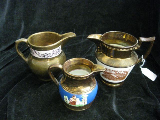 Appraisal: Victorian Copper Luster Pitchers various designs tallest is