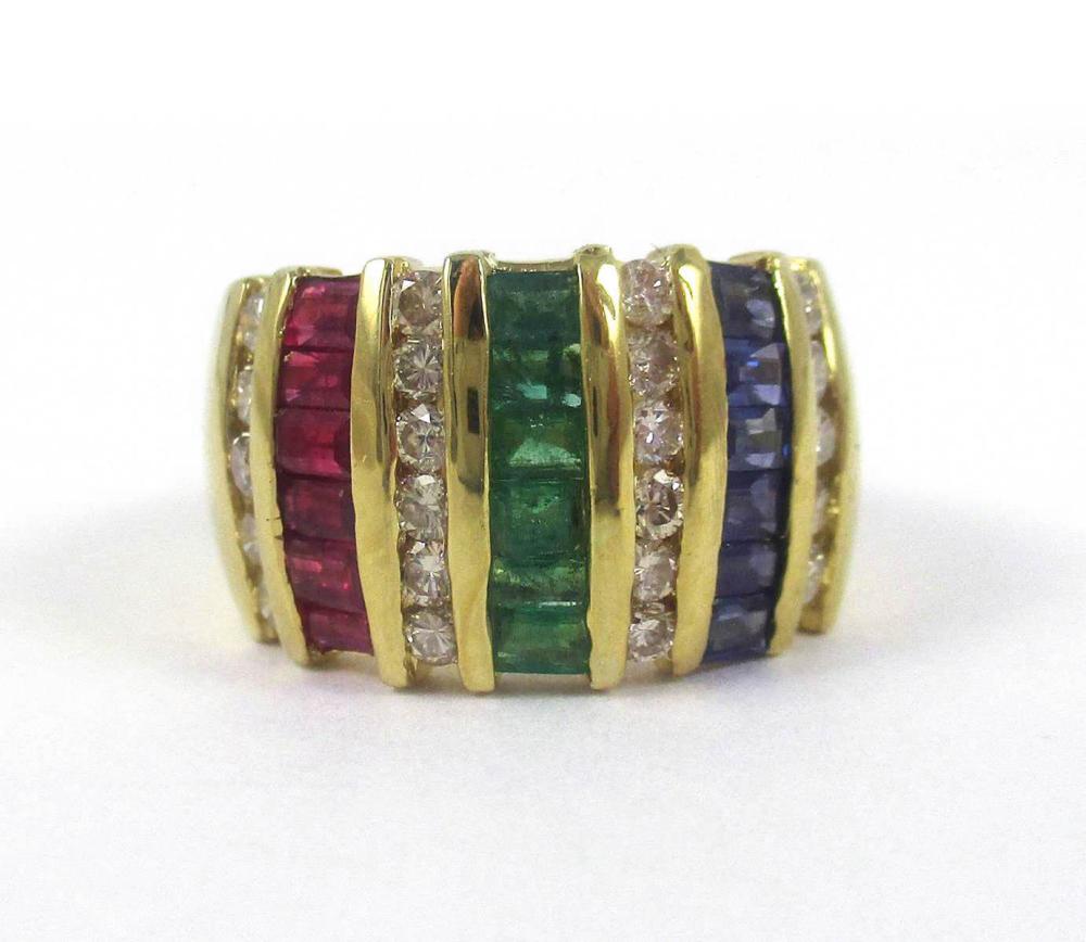 Appraisal: RUBY EMERALD SAPPHIRE AND EIGHTEEN KARAT GOLD RING channel set