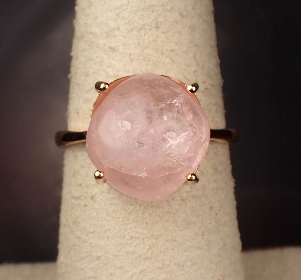 Appraisal: ROSE QUARTZ AND FOURTEEN KARAT ROSE GOLD RING The solitaire