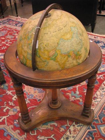 Appraisal: A vintage globe on stand with Replogle world classic globe