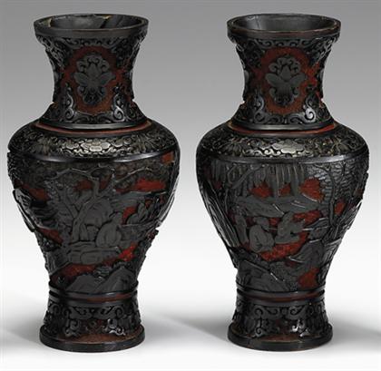 Appraisal: Pair of Chinese black on red cinnabar overlay lacquered vases