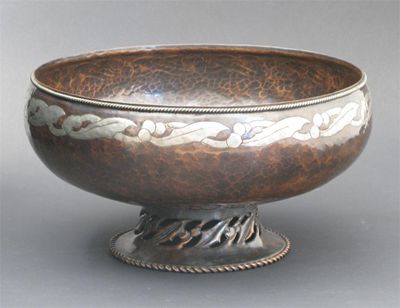 Appraisal: A Hugh Wallis patinated and mixed metal bowl on pierced