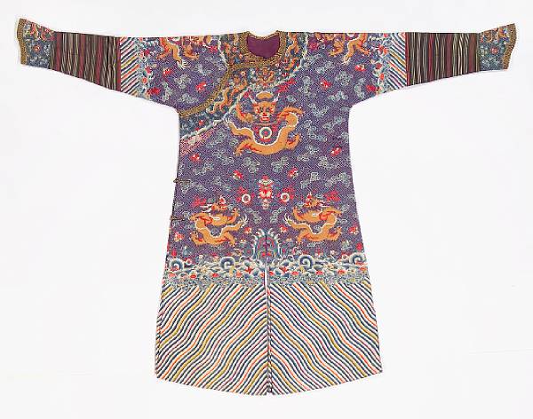 Appraisal: A dark purple silk ground embroidered nine-dragon robe Late Qing