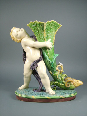 Appraisal: A large Minton majolica cornucopia April in typically coloured glazes