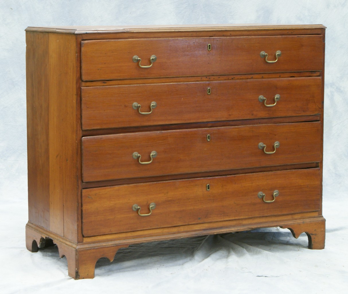 Appraisal: Cherry drawer Chippendale chest lipped drawers replaced brasses bracket base