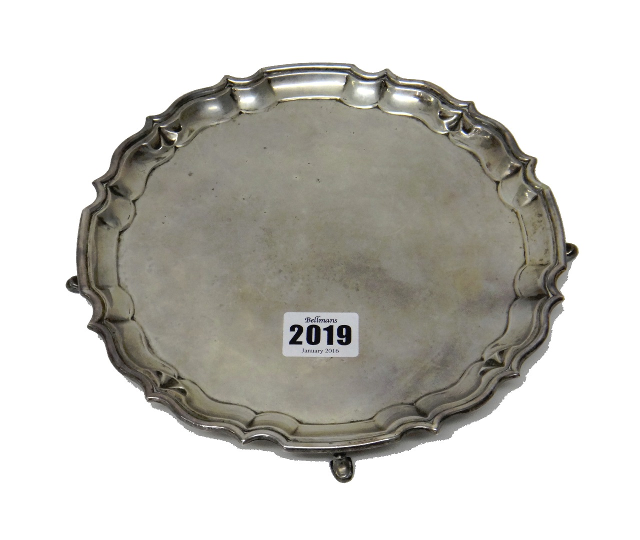 Appraisal: A silver shaped circular salver having a pie-crust rim raised