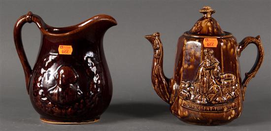 Appraisal: American Rockingham type relief decorated glazed pottery pitcher and a