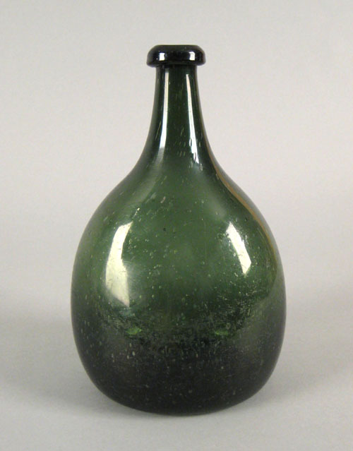 Appraisal: Blown green glass bottle th c h