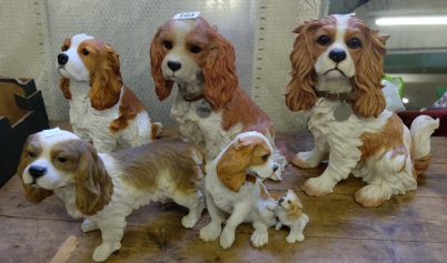 Appraisal: A collection of large resin models of King Charles Spaniels