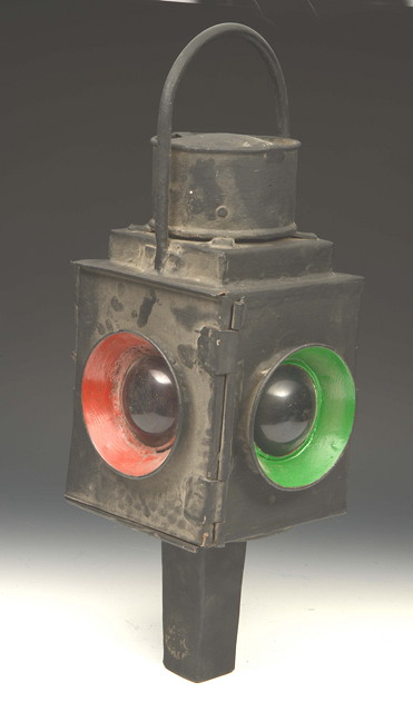 Appraisal: A BLACK PAINTED FOUR GLASS RAILWAY LANTERN possibly from a