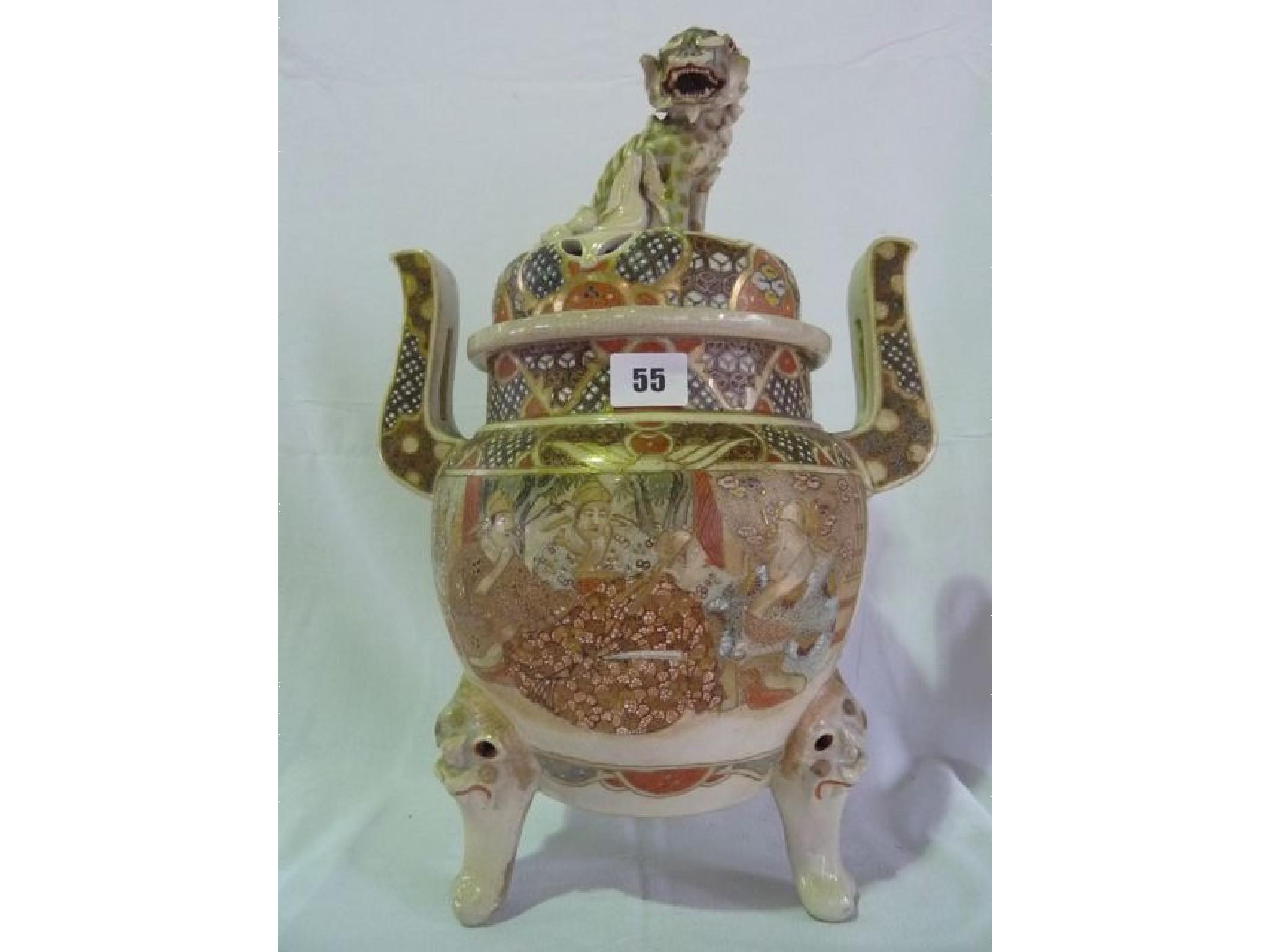 Appraisal: A substantial stoneware koro with lion finial to lid and