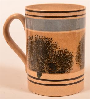 Appraisal: Seaweed Mocha Decorated China Mug Black seaweed on tan band