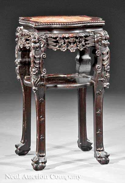 Appraisal: A Chinese Carved Hardwood Stand quatrefoil top with beaded edge