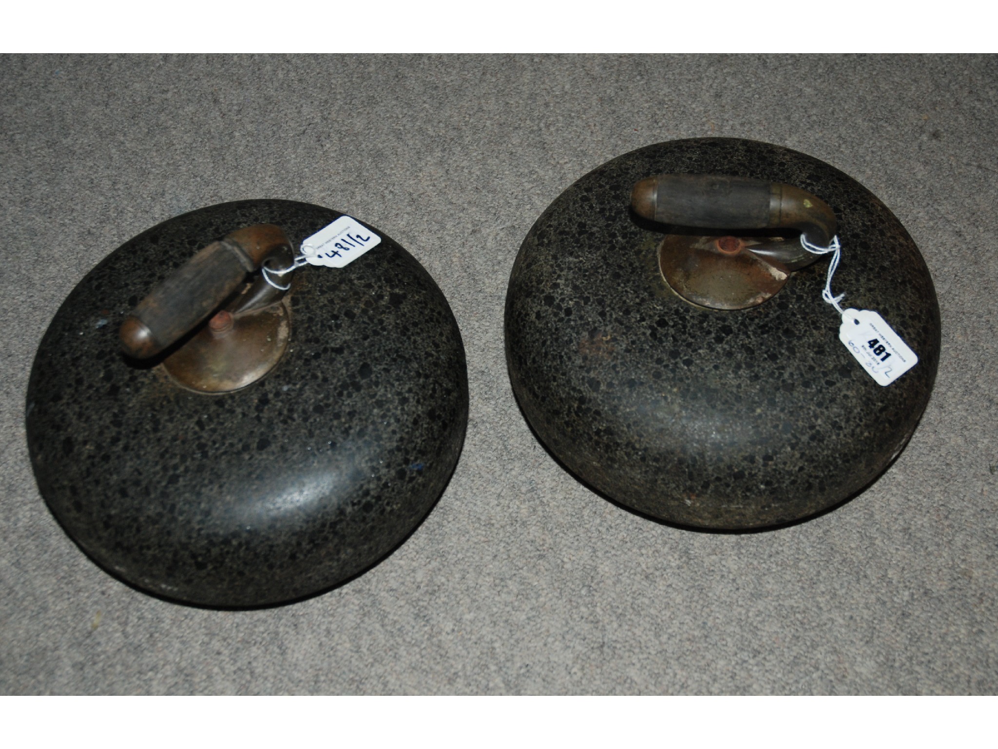 Appraisal: A pair of granite curling stones