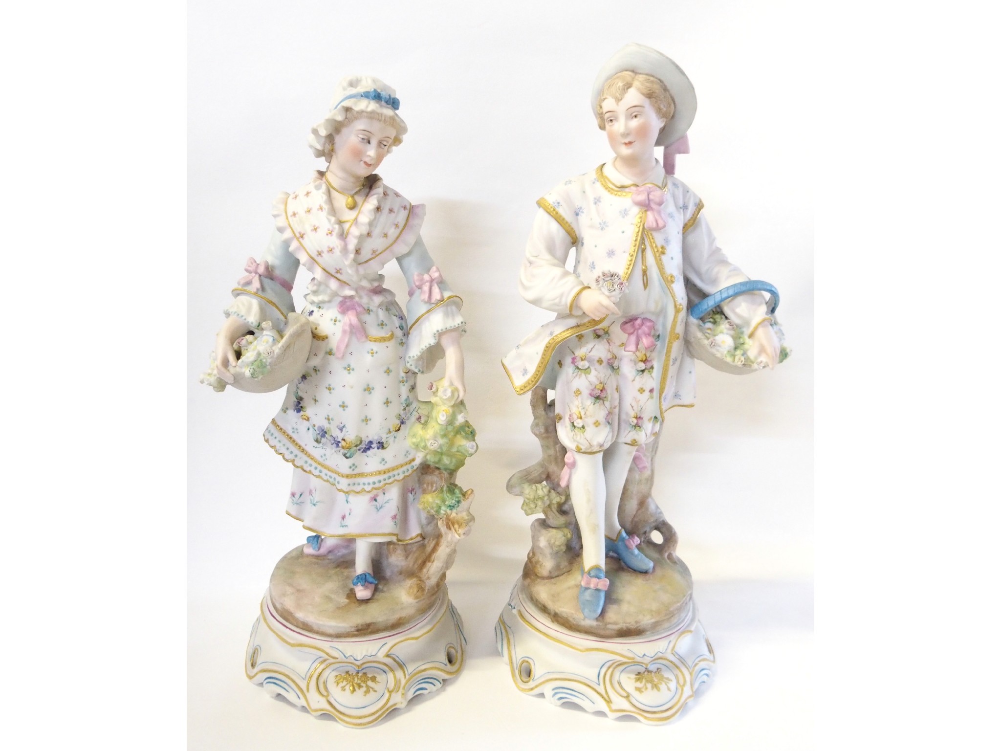 Appraisal: A pair of French bisque figures of a man and