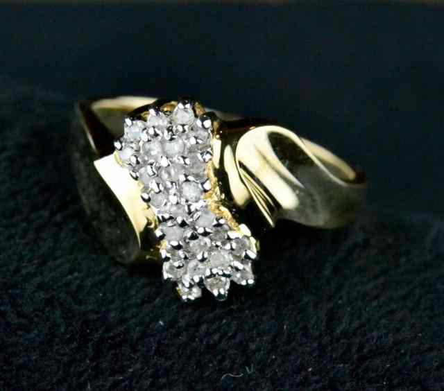 Appraisal: LADY'S DIAMOND RINGConsisting of karat yellow gold band grams single