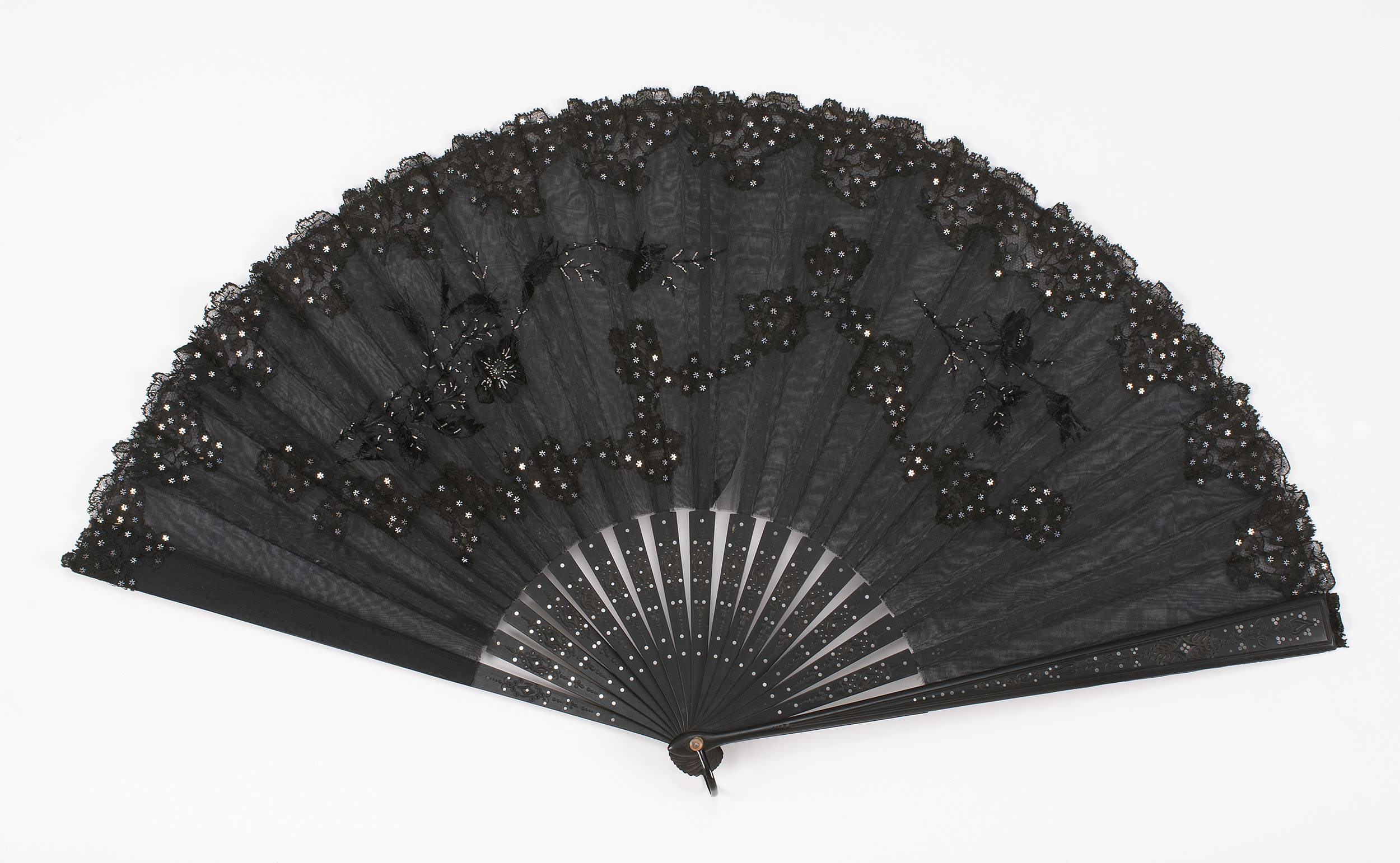 Appraisal: BLACK EMBROIDERED SILK LACE AND EBONY FOLDING FAN France Late