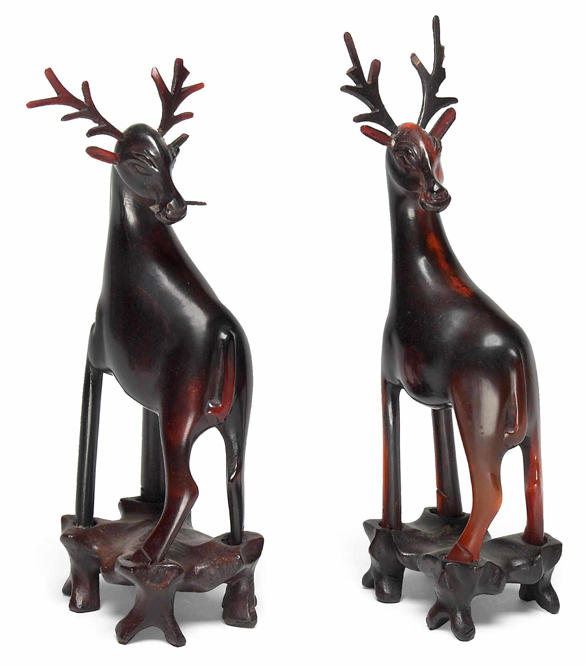 Appraisal: A pair of small Chinese amberine figures of deer height