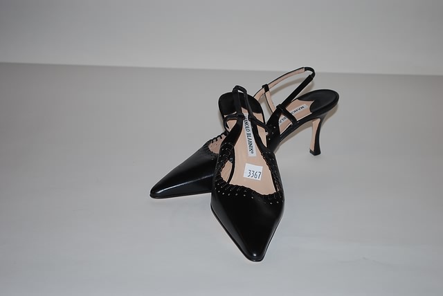 Appraisal: Manolo Blahnik black leather cut-out sling back Size - Good