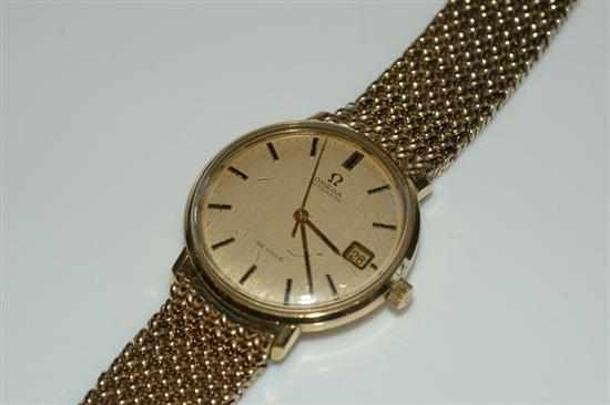 Appraisal: AN OMEGA DE VILLE AUTOMATIC WRISTWATCH WITH BATON NUMERALS AND