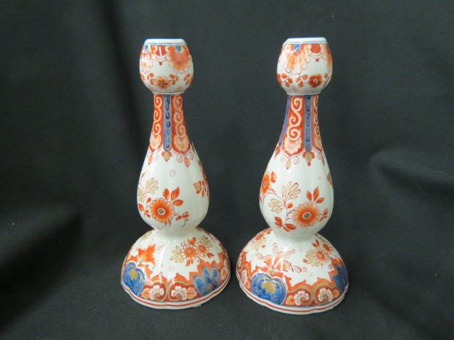 Appraisal: Royal Delft Pottry Candlesticks Imari color floral excellent