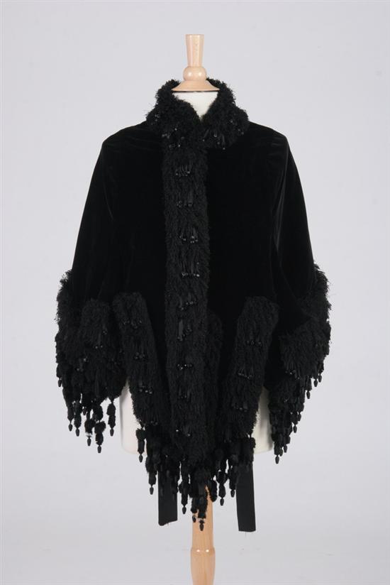 Appraisal: VICTORIAN MOURNING COSTUME circa A black velvet capelet with tufted