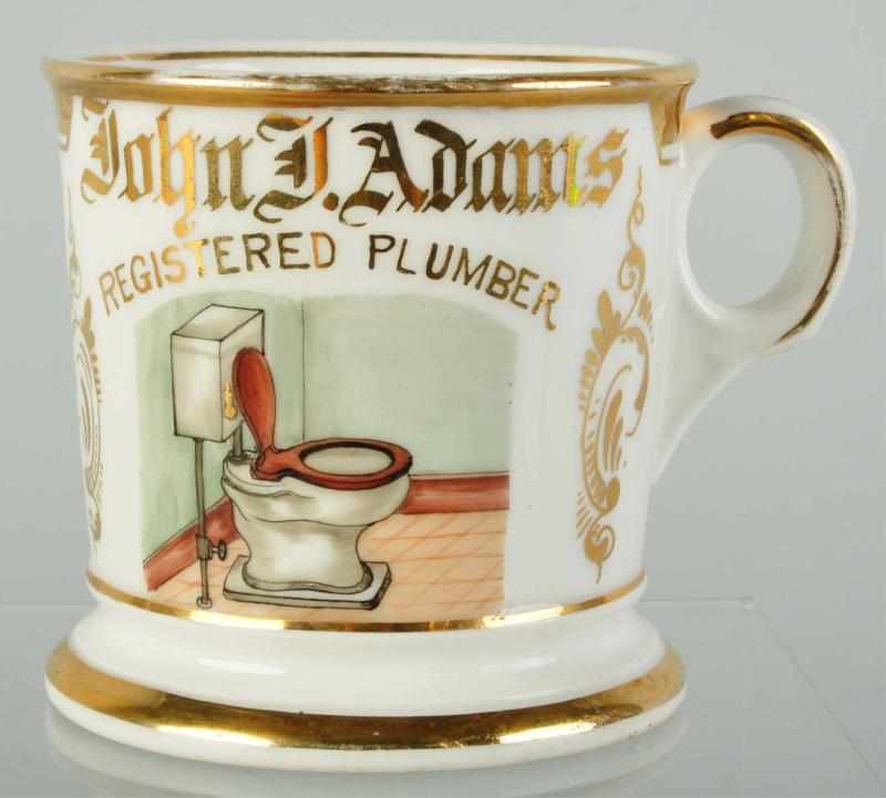 Appraisal: Plumber Shaving Mug Description Guilt name John J Adams and