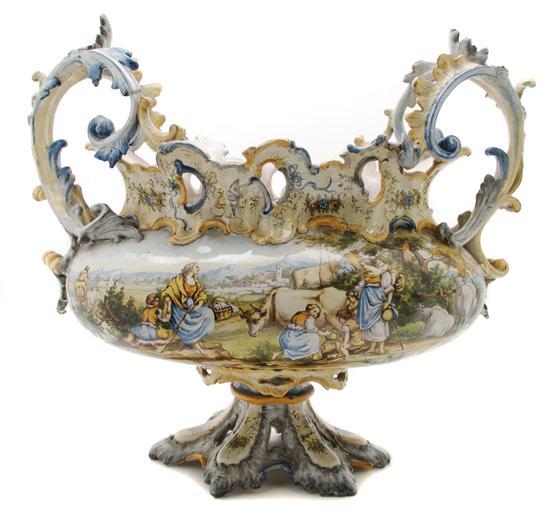 Appraisal: A Continental Faience Jardiniere with figures in a pastoral scene