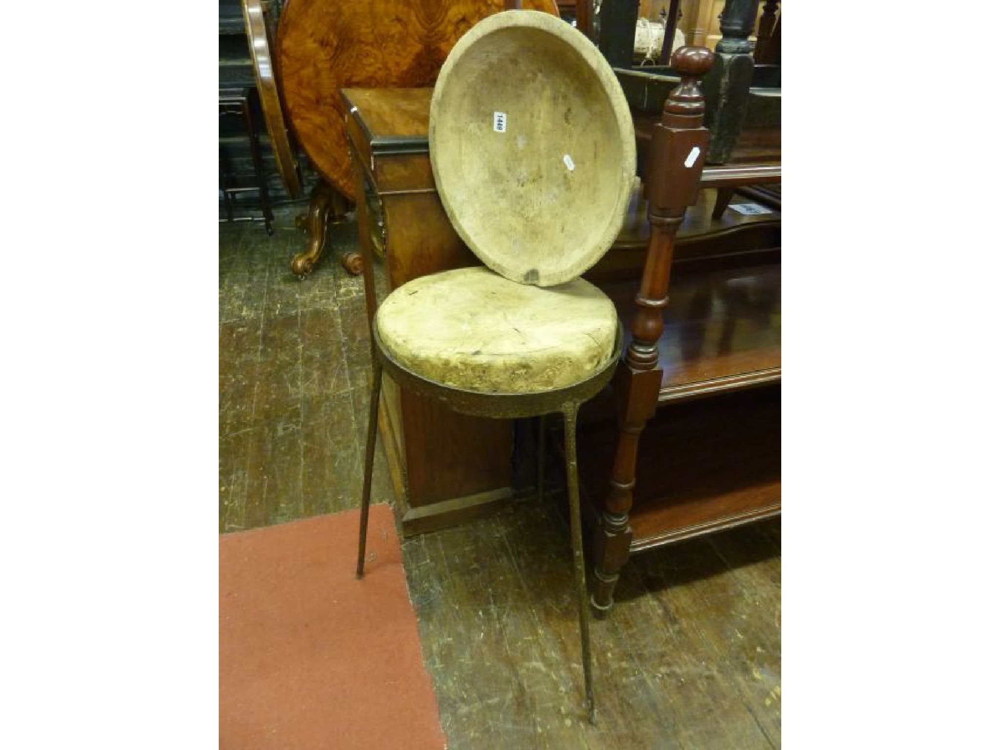 Appraisal: A circular oak work or cheese table raised on an