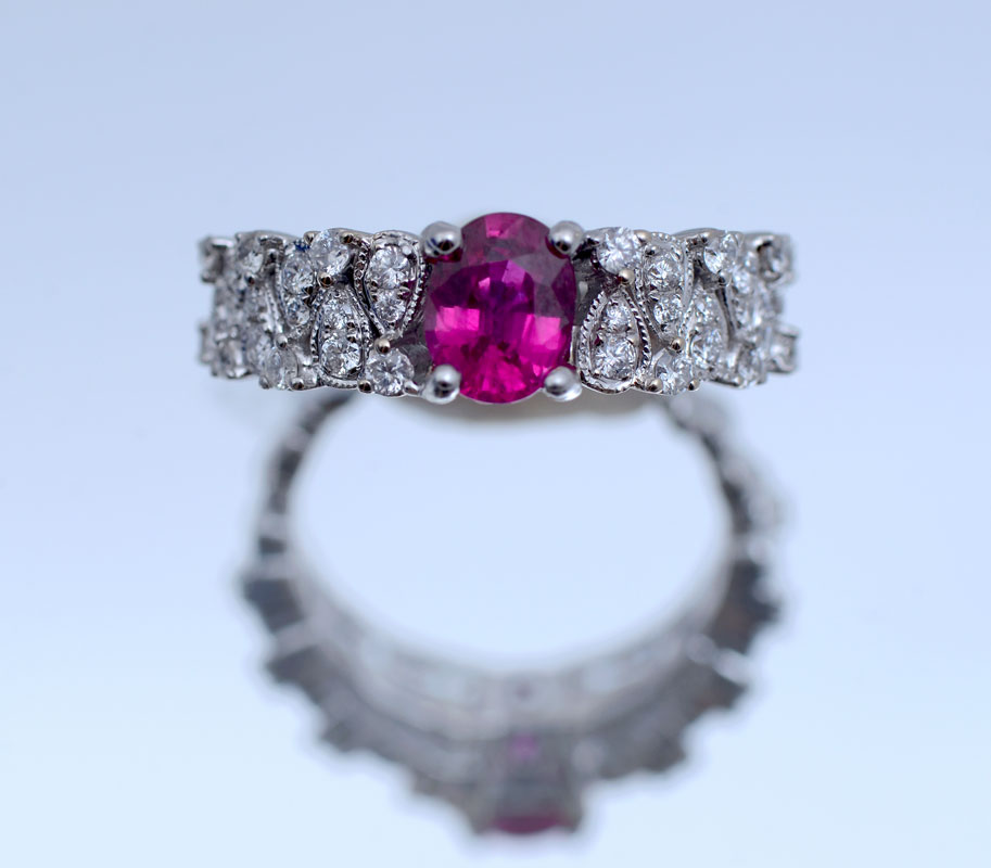 Appraisal: K RUBY AND DIAMOND RING CT ruby is purplish-pink in