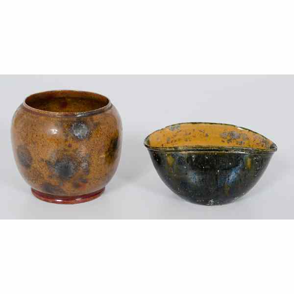 Appraisal: George Ohr Cups Pair of glazed cups by the Mad